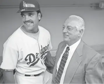  ?? 1997 PHOTO BY ELSA, GETTY IMAGES ?? Mike Piazza was drafted in 1988 by the Dodgers at the behest of manager Tommy Lasorda.