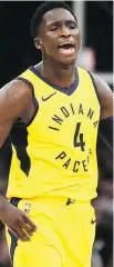  ?? GREGORY SHAMUS/ GETTY IMAGES ?? Indiana Pacers guard Victor Oladipo reacts to three-point basket in the fourth quarter of Game 1 against the Cleveland Cavaliers on Sunday in Cleveland.