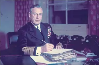  ??  ?? First Sea Lord Louis Mountbatte­n at his office in Admiralty House, London in 1955