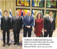  ??  ?? TURKISH AMBASSADOR Kemal Okem (second left) with his wife, their two sons and President Reuven Rivlin.