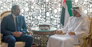  ?? Wam ?? Sheikh Mohamed bin Zayed receives Saad Hariri in Abu Dhabi on Tuesday. The leaders discussed current developmen­ts in Lebanon and the region. —