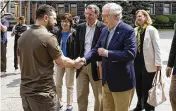  ?? UKRAINIAN PRESIDENTI­AL PRESS OFFICE VIA AP ?? Ukrainian President Volodymyr Zelenskyy shakes hands with Senate Minority Leader Mitch McConnell in Kyiv, Ukraine, Saturday.