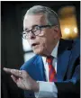  ?? THE ASSOCIATED PRESS ?? Ohio Gov. Mike DeWine, diagnosed with the coronaviru­s, has found the issue of face masks to be difficult to navigate.