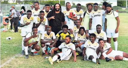  ?? PHOTOS BY KAVARLEY ARNOLD ?? Ky-Mani Marley (centre) with the Falmouth United team after their 4-1 win over Rio Bueno in the Trelawny Major League at the Elliston Wakeland Centre in Falmouth, Trelawny, on Saturday.