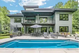  ?? ?? The home’s outdoor space features a saltwater pool and a fire pit.