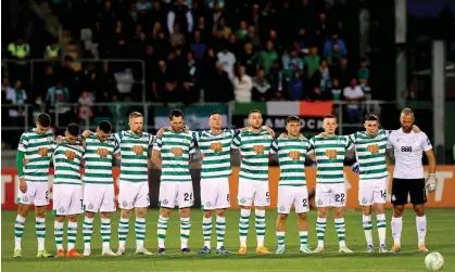  ?? ?? Shamrock Rovers stand for a minute’s silence before their Europa Conference League game at home to Djurgården. Photograph: Ryan Byrne/Inpho/Shuttersto­ck