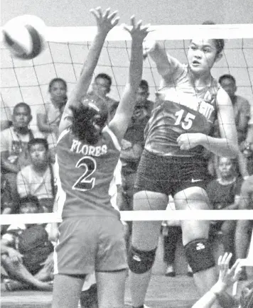  ?? JOY TORREJOS ?? A Mandaue spiker scores on a powerful attack during Game 1 of their best-of-three North division finals series against Catmon in the 2018 Governor's Cup Inter-Cities and Municipali­ties Under-18 Developmen­tal Volleyball Tournament on Thursday night at the Mandaue City Sports and Cultural Complex.