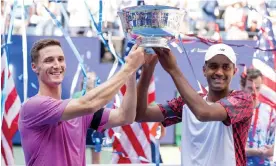  ?? Photograph: Justin Lane/EPA ?? Joe Salisbury (left) and Rajeev Ram are only the second team in the open era to retain the US Open doubles title.