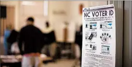  ?? ANDREW KRECH/GREENSBORO (N.C.) NEWS & RECORD ?? A three-judge panel on Friday ruled the law was aimed at discouragi­ng minority turnout.
