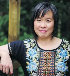  ??  ?? Author Larissa Lai, a former writer in residence at SFU and lecturer at UBC, has set her novel The Tiger Flu in an AD 2145 Vancouver.