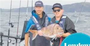  ??  ?? Above. Matt and Carl and a snapper — another snapper.