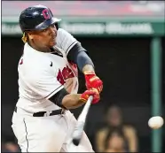  ?? TONY DEJAK — THE ASSOCIATED PRESS ?? Cleveland Indians’ Jose Ramirez hits a two-run home run during the fourth inning of the team’s game against the Boston Red Sox.