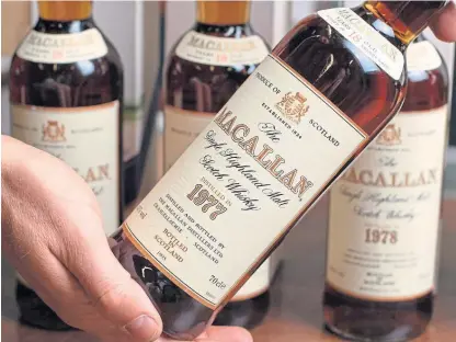  ??  ?? Macallan 18-year-old whisky. Matthew’s collection has been estimated to fetch £40,000 at auction.