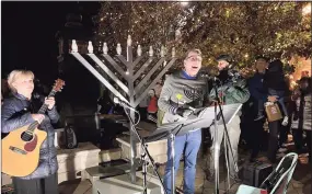  ?? Bob Duff / Contribute­d photo ?? Event organizer Dan Guller makes remarks during a townwide menorah lighting, widely believed to be the first in Darien’s history, on Wednesday.