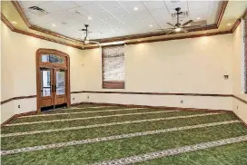  ?? [PHOTO BY CHRIS LANDSBERGE­R, THE OKLAHOMAN] ?? A secondary prayer room is shown in the Islamic Society of Edmond’s newly renovated mosque in Edmond.