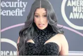  ?? RICH FURY — GETTY IMAGES ?? Cardi B, host of Sunday’s American Music Awards, attends the event’s Red Carpet Roll-Out in Los Angeles on Friday.