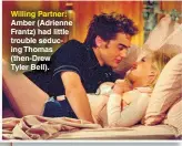  ?? ?? Willing Partner: Amber (Adrienne Frantz) had little trouble seducing Thomas (then-drew
Tyler Bell).