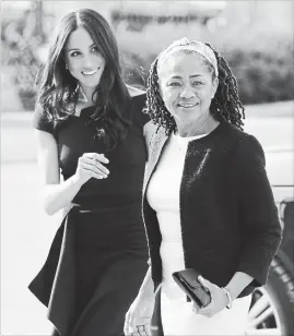  ?? STEVE PARSONS THE ASSOCIATED PRESS ?? Meghan Markle, left and her mother, Doria Ragland, arrive at Cliveden House Hotel in Berkshire, England, on Friday.