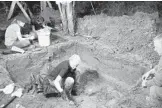  ?? REUTERS ?? University of South Florida assistant professor of anthropolo­gy Dr. Erin Kimmerle exhumes a grave in 2013 at the Boot Hill cemetery at the now closed Arthur G. Dozier School for Boys in Marianna.