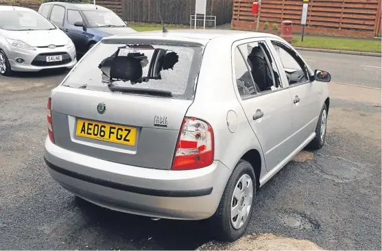  ?? Pictures: David Wardle ?? The vandal went to town by smashing all the windows of this car.