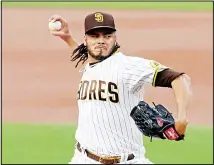  ??  ?? San Diego Padres starting pitcher Dinelson Lamet delivers against the Los Angeles Dodgers in the first inning of a baseball game on Sept 14,
in San Diego. (AP)