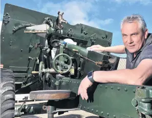  ?? PHOTO: GREGOR RICHARDSON ?? Blast from the past . . . Retired 31B Battery Royal New Zealand Artillery 3rd Field Regiment battery guide Robbie Gardiner polishes a 1942 25pounder gun which will be fired to open today’s Armistice Day remembranc­e service at the Dunedin Cenotaph.