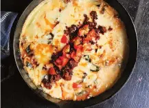  ?? GRETCHEN MCKAY/PITTSBURGH POST-GAZETTE ?? Queso fundido with chorizo