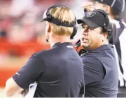  ?? Ben Margot / Associated Press 2018 ?? Raiders defensive coordinato­r Paul Guenther (right) said 2018 was his “hardest year in coaching.”