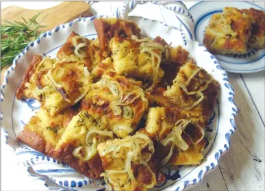  ?? Associated Press photo ?? This photo shows onion beer bread in New York.