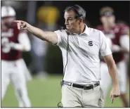  ?? (AP/Artie Walker Jr.) ?? South Carolina Coach Shane Beamer broke a bone in his foot when he kicked a water cooler during the fourth quarter of the Gamecocks’ 41-39 loss to Florida on Saturday. “Stupid on my part,” Beamer said.