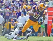  ?? AP FILE PHOTO/BILL FEIG ?? LSU tight end Thaddeus Moss is the son of former NFL star Randy Moss. He has 24 catches for 216 yards in the past five games for the undefeated Tigers.