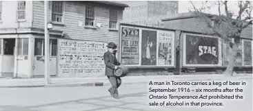  ??  ?? A man in Toronto carries a keg of beer in September 1916 — six months after the Ontario Temperance Act prohibited the sale of alcohol in that province.