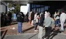 ?? Photograph: Darren Pateman/AAP ?? Newcastle residents queue for testing at The Mater hospital Newcastle.