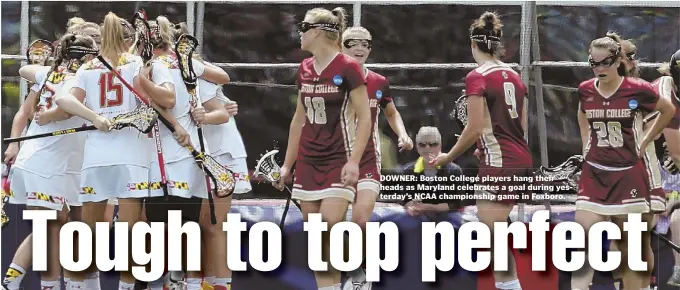  ??  ?? DOWNER: Boston College players hang their heads as Maryland celebrates a goal during yesterday’s NCAA championsh­ip game in Foxboro.