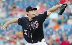  ?? ROB CARR/GETTY IMAGES ?? The 13-0 start by Washington Nationals pitcher Stephen Strasburg is the sixth-longest streak in major league history.