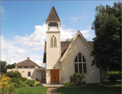  ?? Special to The Daily Courier ?? The Benvoulin Church has protected heritage status and Kelowna city council was expected Tuesday to extend the designatio­n to include a hall, left, built in 2000, as well as a 1904 farmhouse and garden also located on the site.