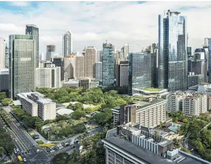  ?? ?? The Makati Central Business District, the premier financial hub with iconic landmarks, modern office skyscraper­s and pocket parks, is Ayala Land’s pioneer master planned developmen­t. It is home to renowned multinatio­nal companies and the country’s biggest businesses.