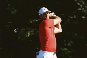  ?? Sam Greenwood / Getty Images ?? Bryson DeChambeau plays his shot from the 14th tee during the second round of the Memorial Tournament on June 3 in Dublin, Ohio.