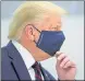  ?? REUTERS ?? US President Donald Trump n sports a mask at a pharma plant in North Carolina.