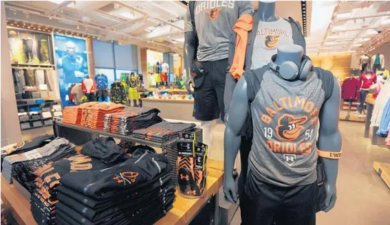  ?? KIM HAIRSTON/BALTIMORE SUN ?? The Under Armour Brand House in Harbor East. Under Armour sales rose to $805 million in the first quarter as the brand made strides to expand internatio­nally and build its footwear business.