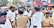  ??  ?? Police pacifying AIADMK and AMMK cadres in Thanjavur on Wednesday