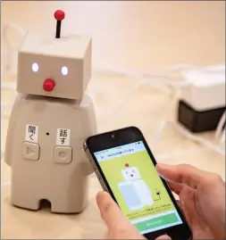  ?? — AFP file photos ?? A robot Bocco is pictured in a studio in Tokyo, Japan.