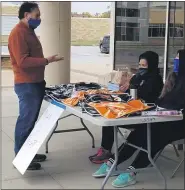  ?? SUSAN SMILEY — FOR THE MACOMB DAILY ?? Andy Levin discusses issues at Sunday’s voter registrati­on and education event at Lincoln High School.