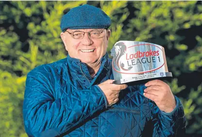  ?? Picture: SNS. ?? Arbroath boss Dick Campbell with his manager of the month award for October.