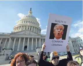  ?? JOSE LUIS MAGANA/AP ?? Demonstrat­ors protest outside of the Capitol during the Senate impeachmen­t trial on Jan. 29.