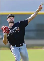  ??  ?? Below: Kyle Muller came in to start the sixth inning, giving up a hit, an earned run and a walk with two strikeouts. Manager Brian Snitker still liked what he saw from Muller.