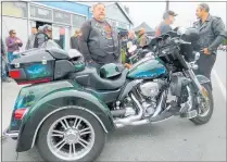  ?? PICTURE / FRANCIS MALLEY ?? Dan ‘Paddles’ Henderson, road captain for the Northland Riders’ Treble T motorcycle rally, prepares to roll out his Harley Davidson trike.