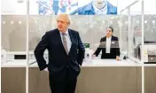  ?? PTI ?? Britain's Prime Minister Boris Johnson visits a shop in Westfield Stratford shopping centre in east London, Sunday, to see the preparatio­ns the stores are making to be COVID-19 secure, ahead of non-essential retail being able to reopen from Monday morning