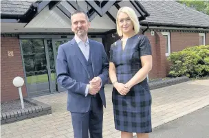  ??  ?? ●●Chief executive Peter Branson and interim general manager Kirsty Franks outside Grace’s Place children’s hospice