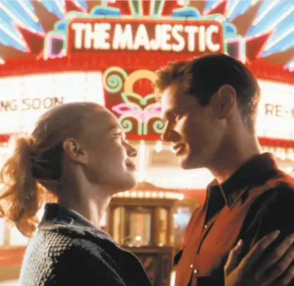  ?? Castle Rock Entertainm­ent ?? Laurie Holden and Jim Carrey in “The Majestic,” a movie about saving a smalltown cinema.